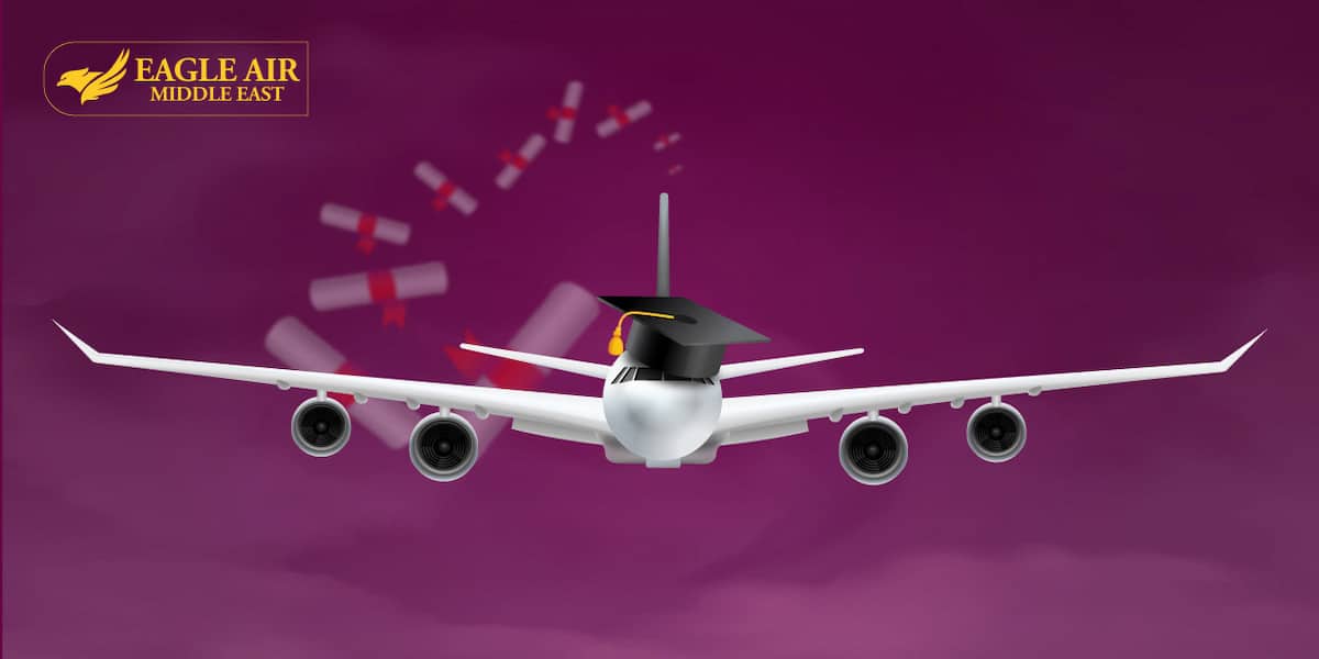 A white airplane with a graduation cap on its head.